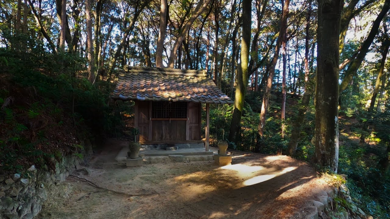 A Small, Quiet Shrine Hidden in the Hills Behind a Japanese Shrine