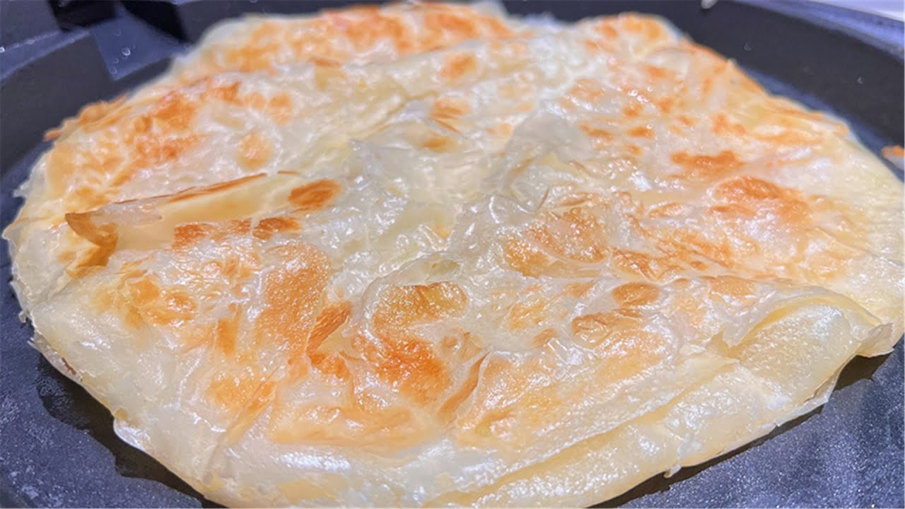 烙饼好吃和面是关键，讲究2揉2饧，全是小薄层，酥香可口特好吃