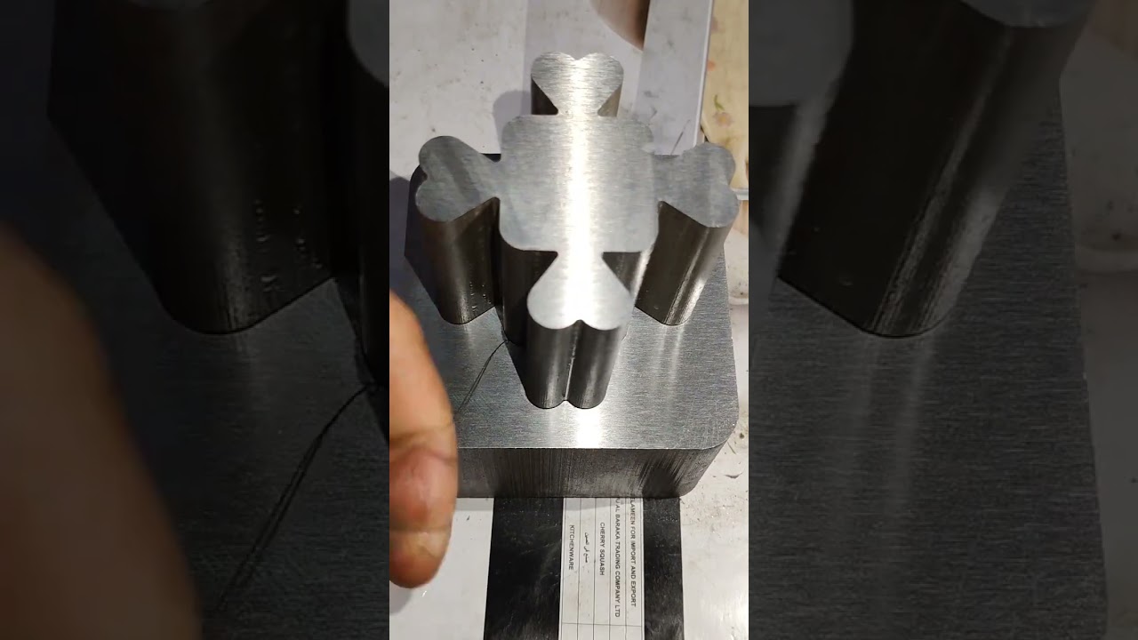 A Level 8 machinist showcases a high precision zero tolerance mold&mdash;you really couldn&rsquo;t fit