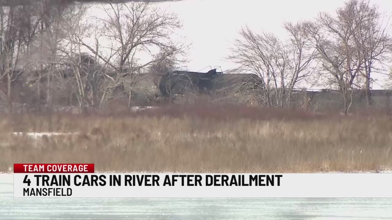 Shelter in place issued after train cars carrying flammable fuel overturn into Mansfield river