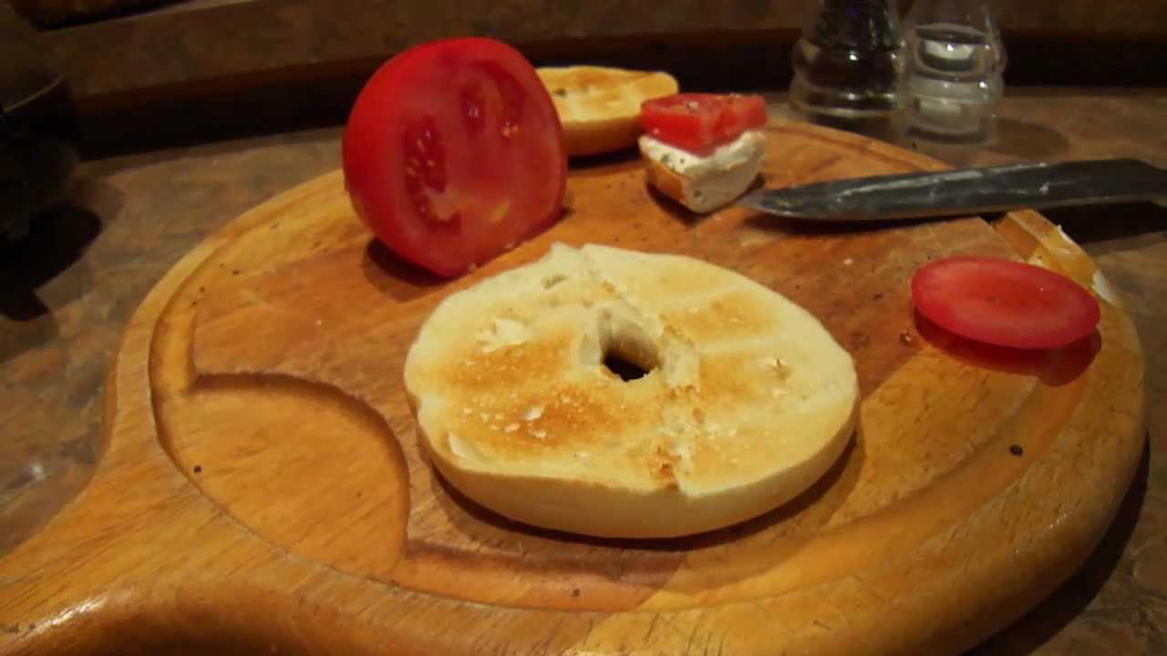 making a cream cheese bagel