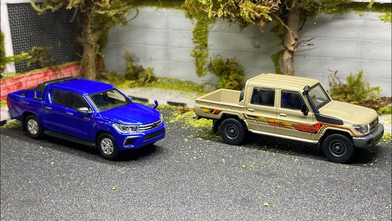 Toyota es Toyota || Unboxing Toyota Hilux a little Ebbro y Toyota land Cruiser para64