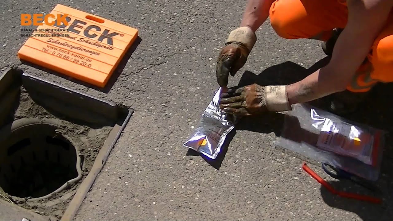 Einlegen Anti-Klapper-Einlage bei Straßenablauf und runden Schachtabdeckungen