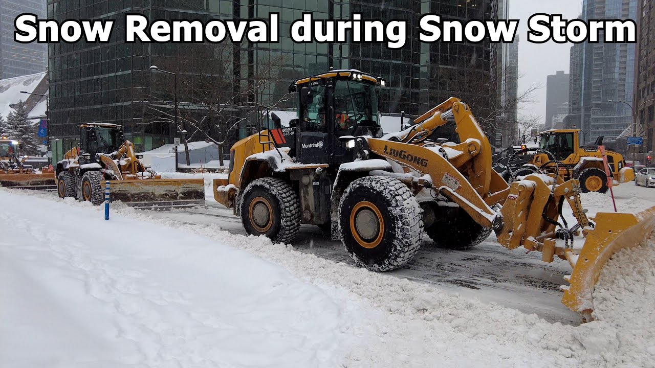 Snow removal during snow storm in downtown Montreal Canada Winter!