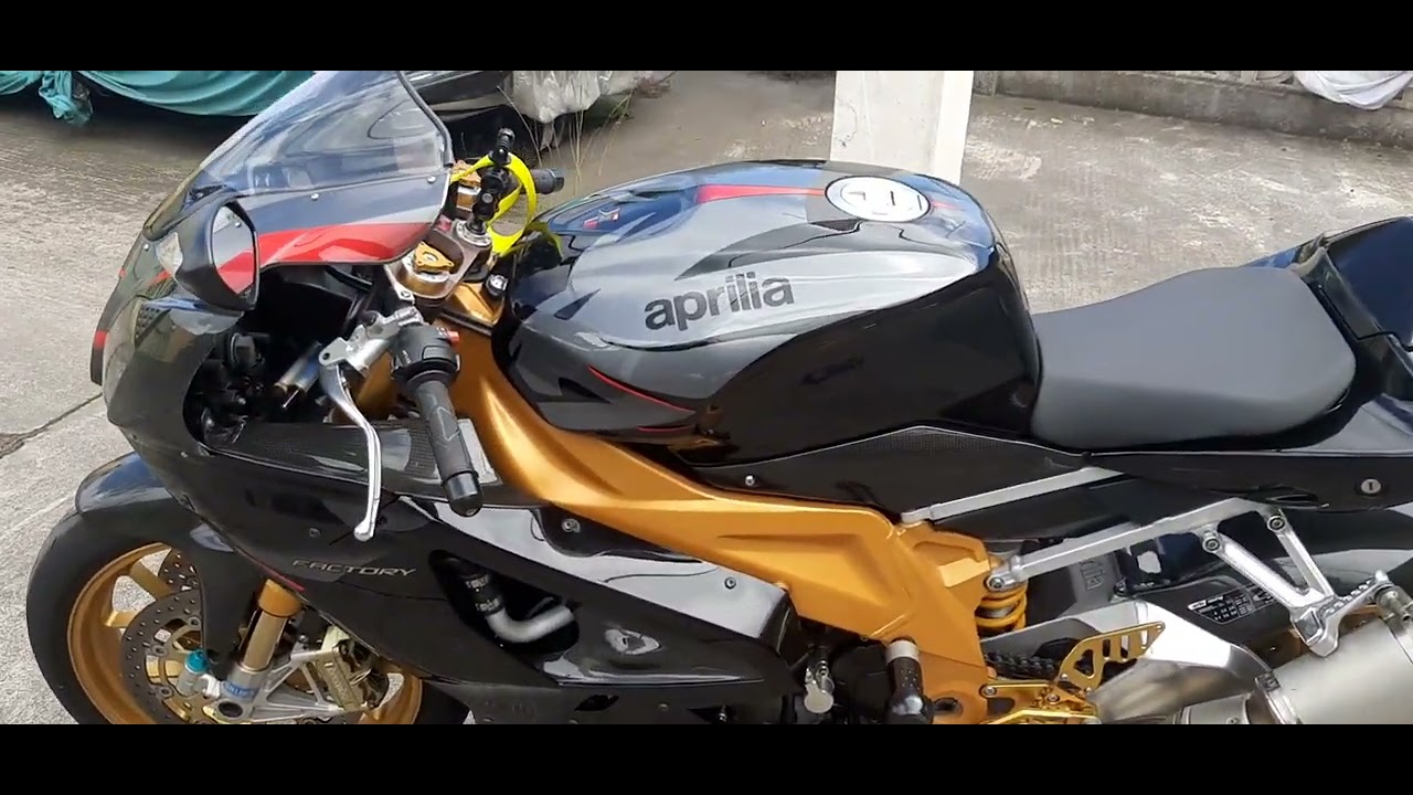 aprilia rsv 1000 factory, black lion.