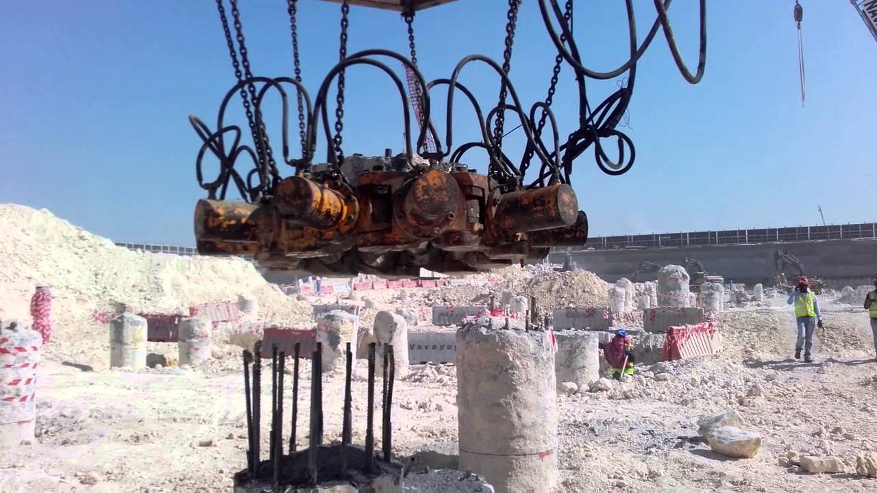 Pile Head Cutting by Hydraulic jack assembly system.