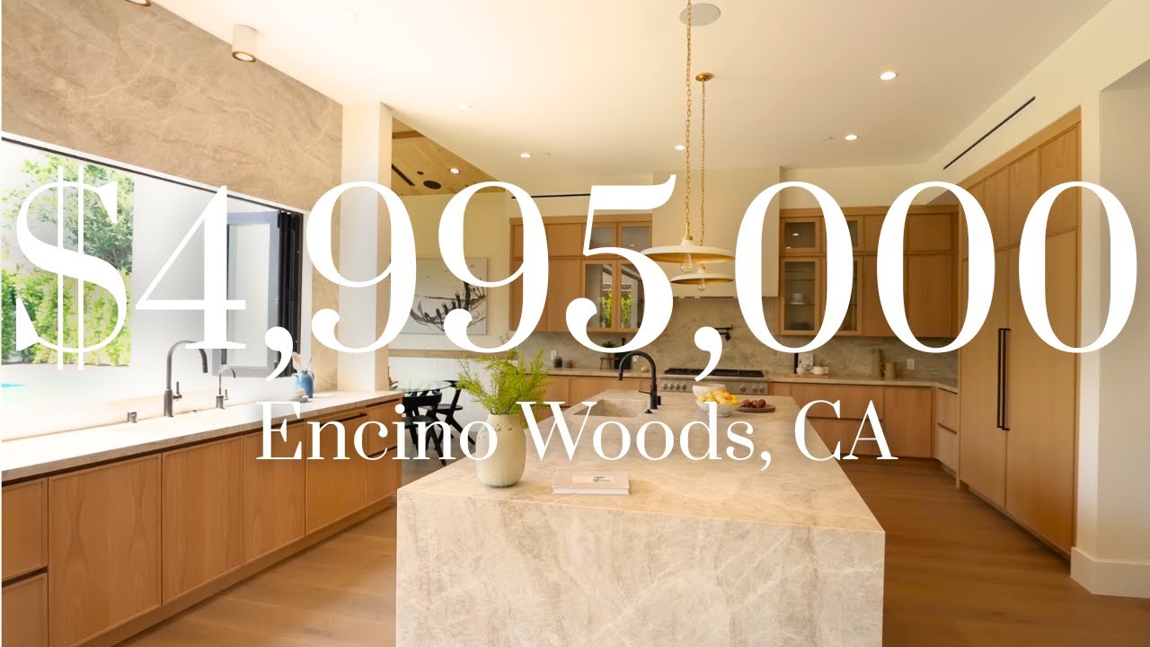 Elegant Modern Farmhouse with Taj Mahal Countertops: Unveiling a Luxurious Gem under $5M