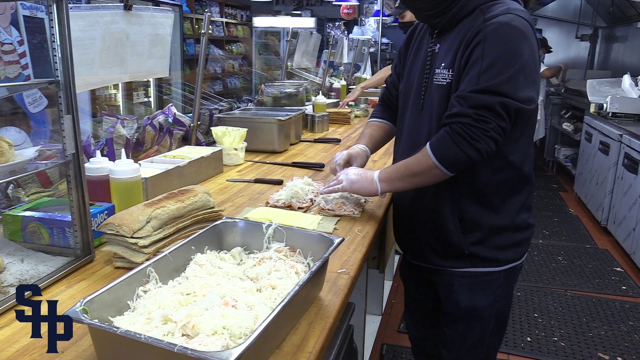 Matt Wonski '09 makes Town Hall Deli's famous Sloppy Joe