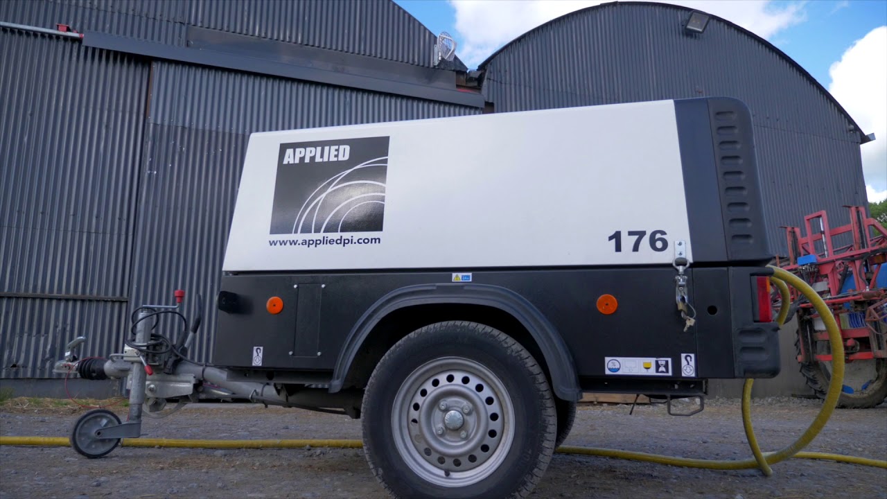 Applied 140 Litre Blast Machine In Action Blasting A Trailer
