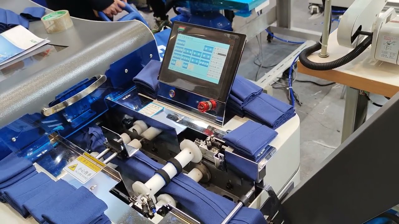 Automatic rib-knit cuff cutting and folding machine for jacket
