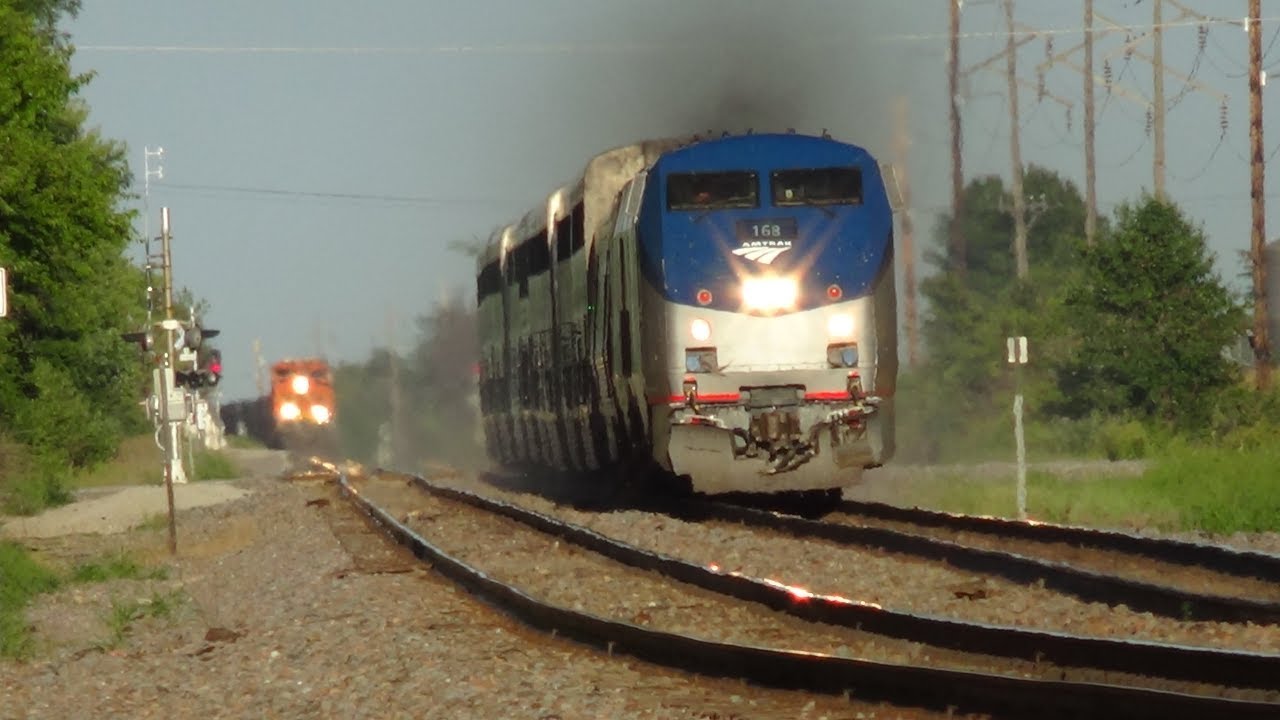 Amtrak #5 Speeds By After Passing Coal Train