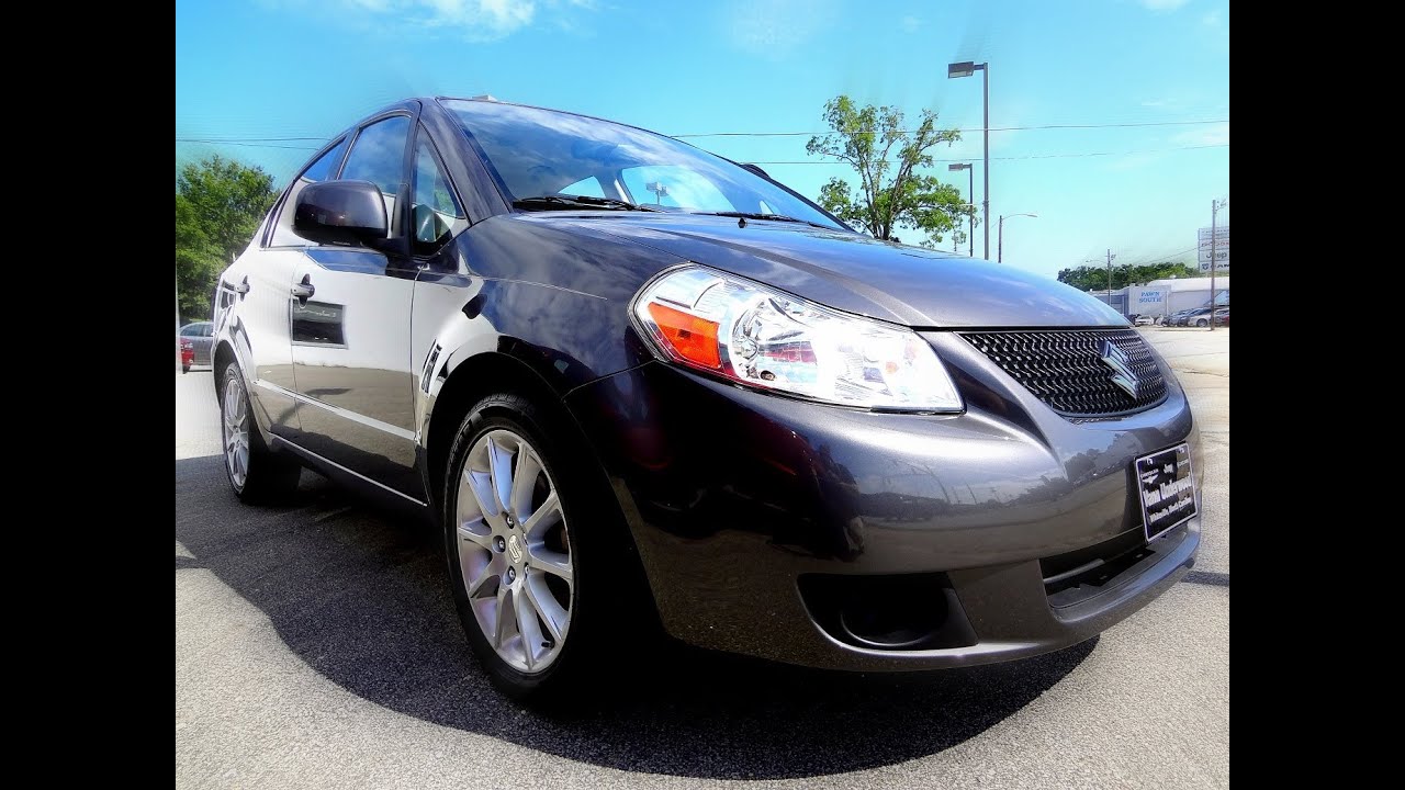 👉 2011 SUZUKI SX4 LE