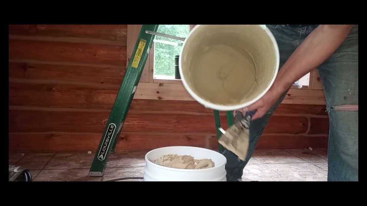 Log Cabin Build Part 35, Log Jam Chinking, caulk gun, follower plate, trick to smooth joint using br