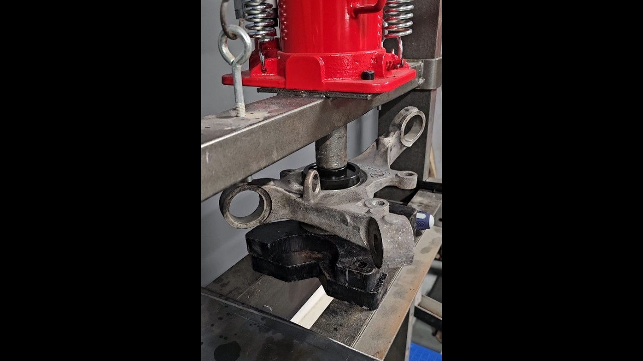 Replacing the wheel hub and bearing on a 1999 Cobra IRS.