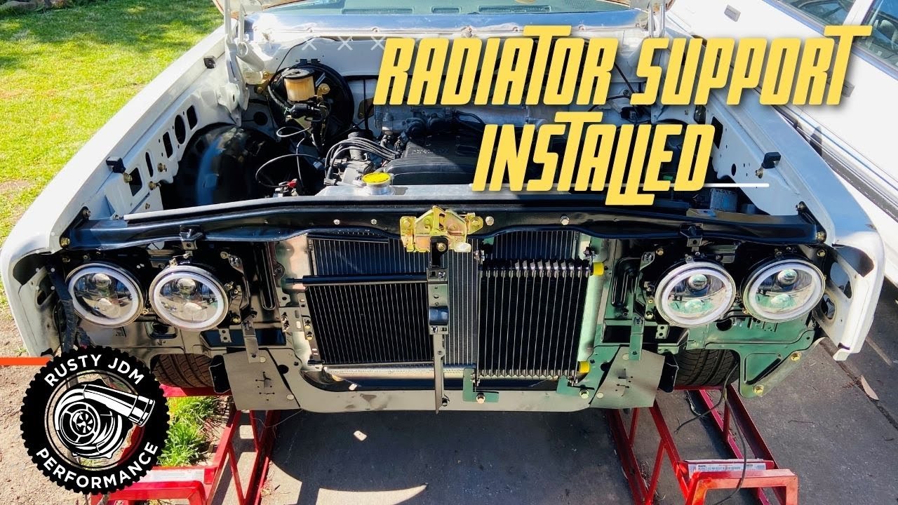 TOYOTA CROWN MS85 1975 2JZ SWAP PART 12 INSTALLED THE RADIATOR SUPPORT INTO THE CAR
