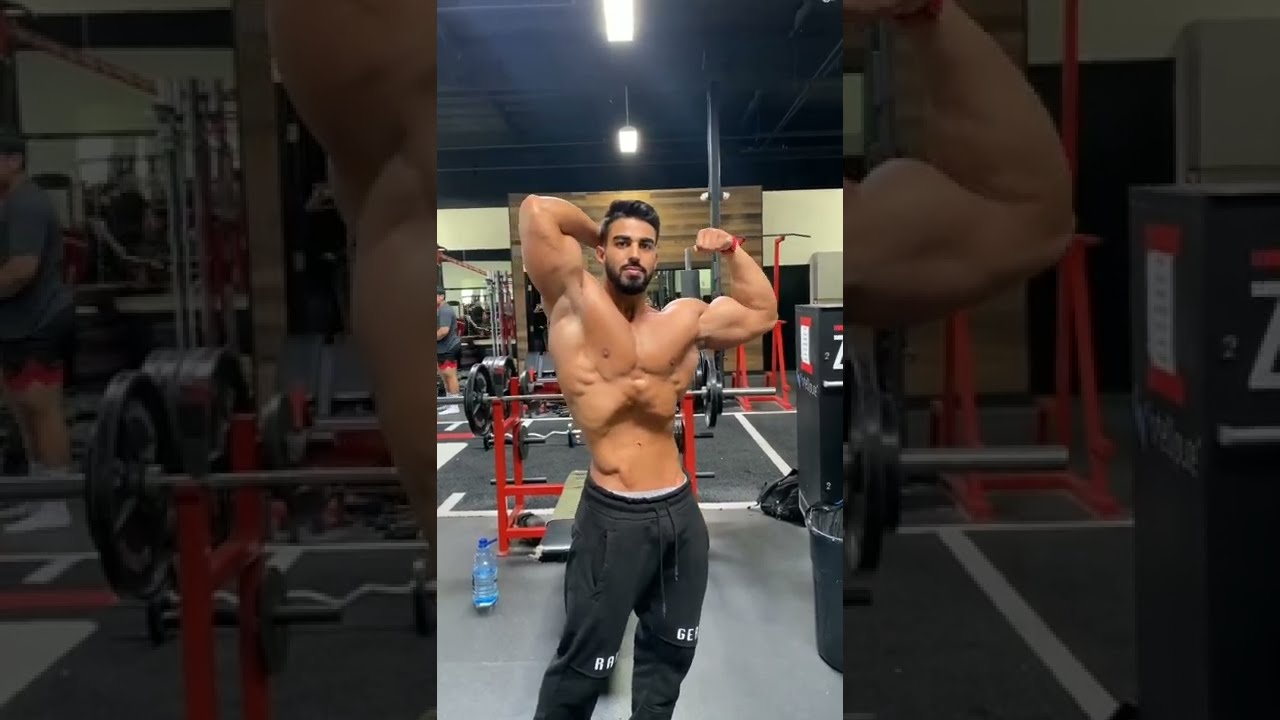 Mardin Gevargiz muscle flexing workout