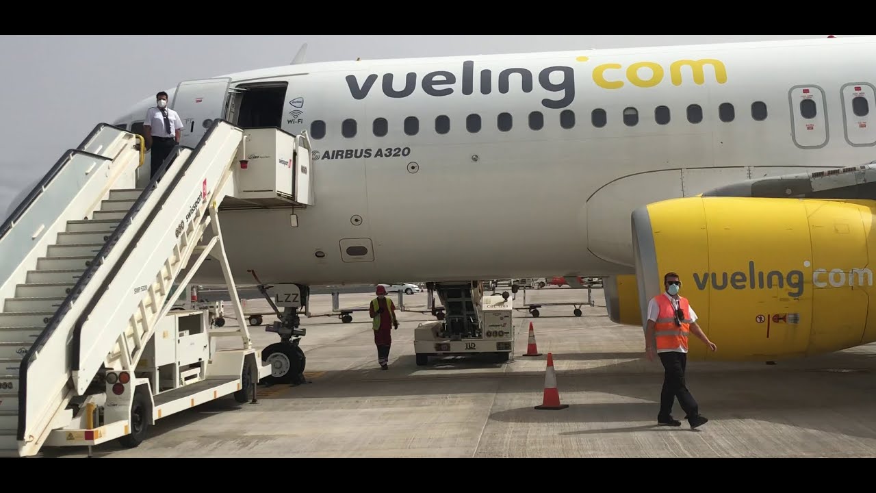 TRIP REPORT | Vueling/ Airbus A320-214 / GCRR/LEBL AEROPUERTO DE BARCELONA CASI VACIO