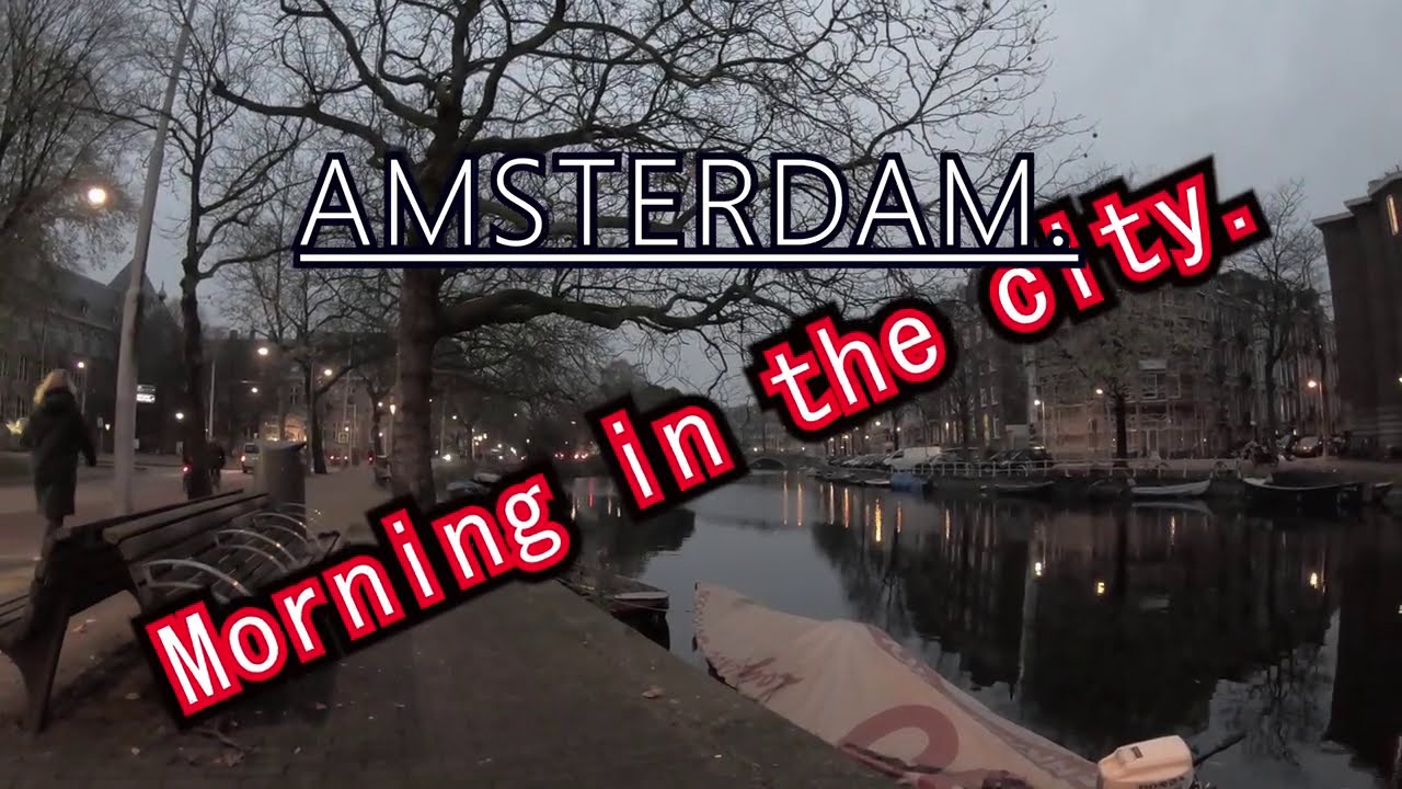 Amsterdam., the old city wakes up.  From east to CS through the ancient city. Nov 2020.