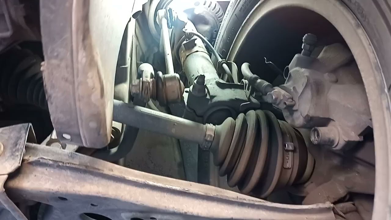 Rangido na suspensão ao passar em lombada ou saliência...