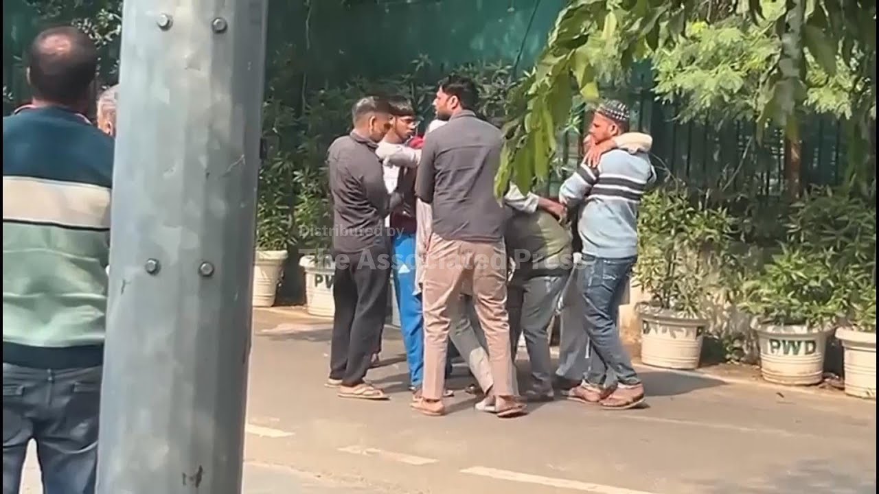 Grieving relations at scene of New Delhi blast which killed 8 people