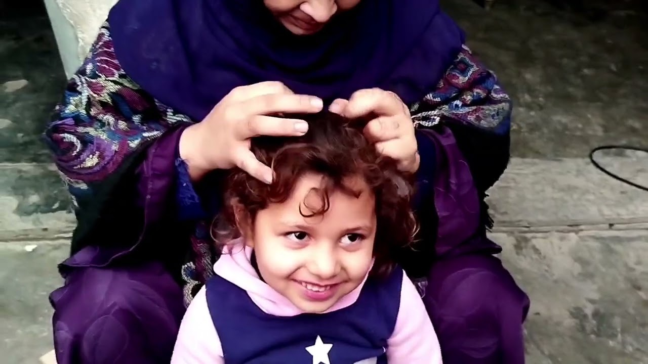 Hair checking of hareem by mom.