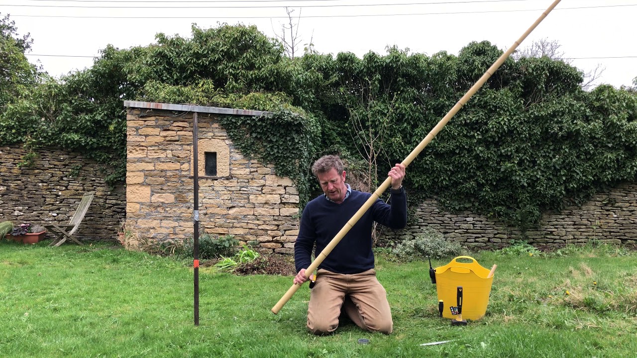 Installation of bamboo pole with new auger
