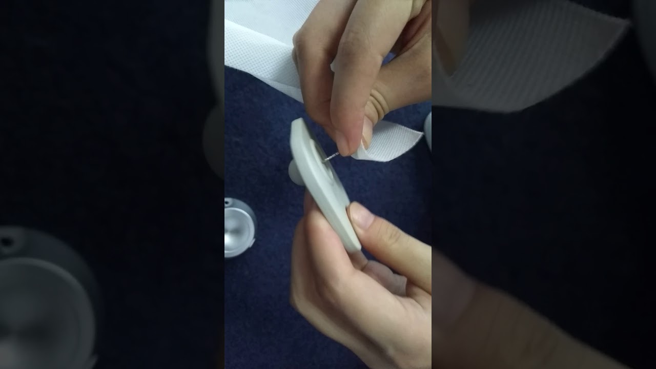 how to use magnet detcher to remove security tag?