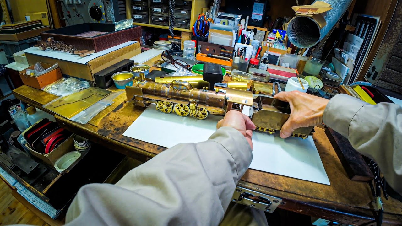 POV: Railway Model Artisan Creating a Highly Detailed Engine Model