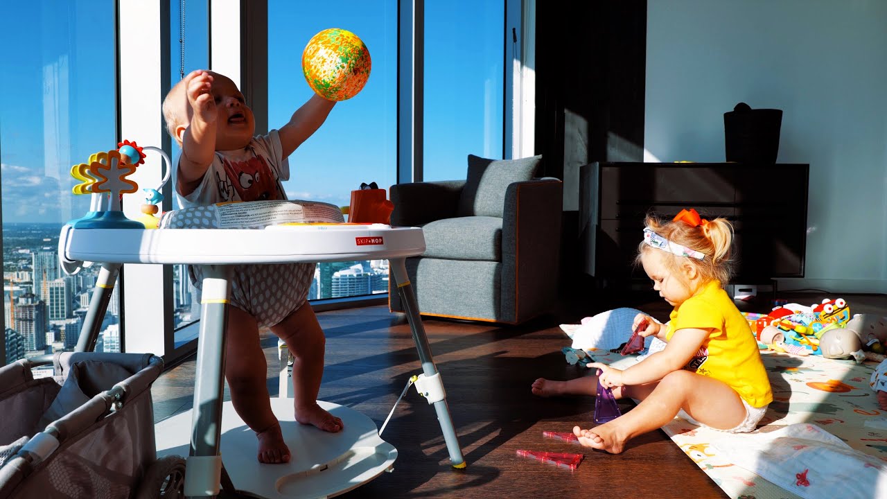 Naomi and David play at home.