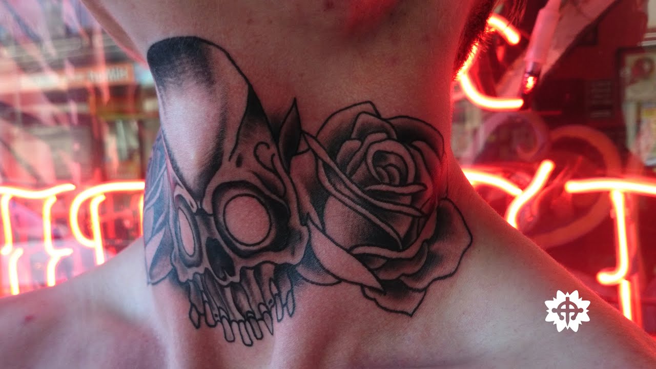 Skull and Roses Neck Tattoo