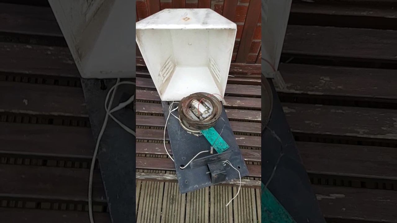 Old vented bellbox with bell before clean up