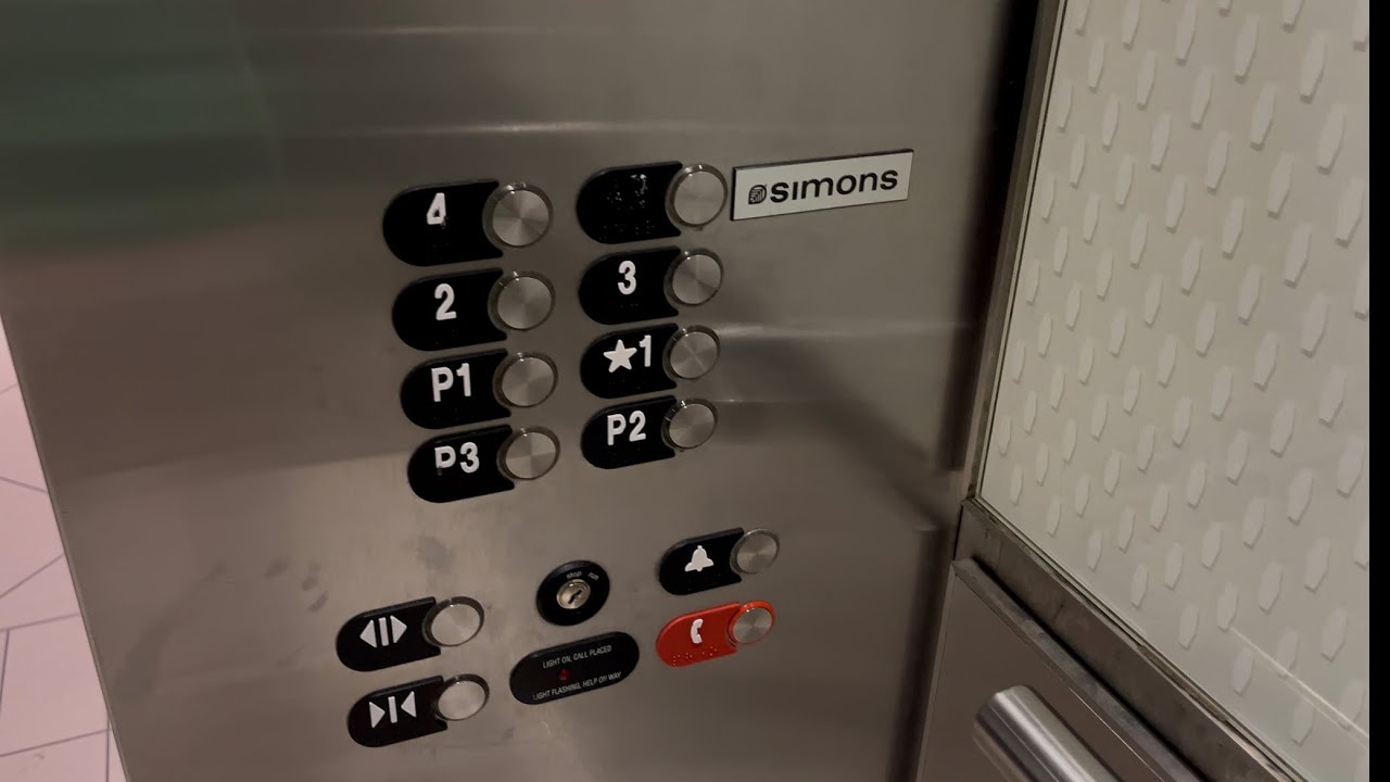Busy Otis elevators at Rideau Center, ON