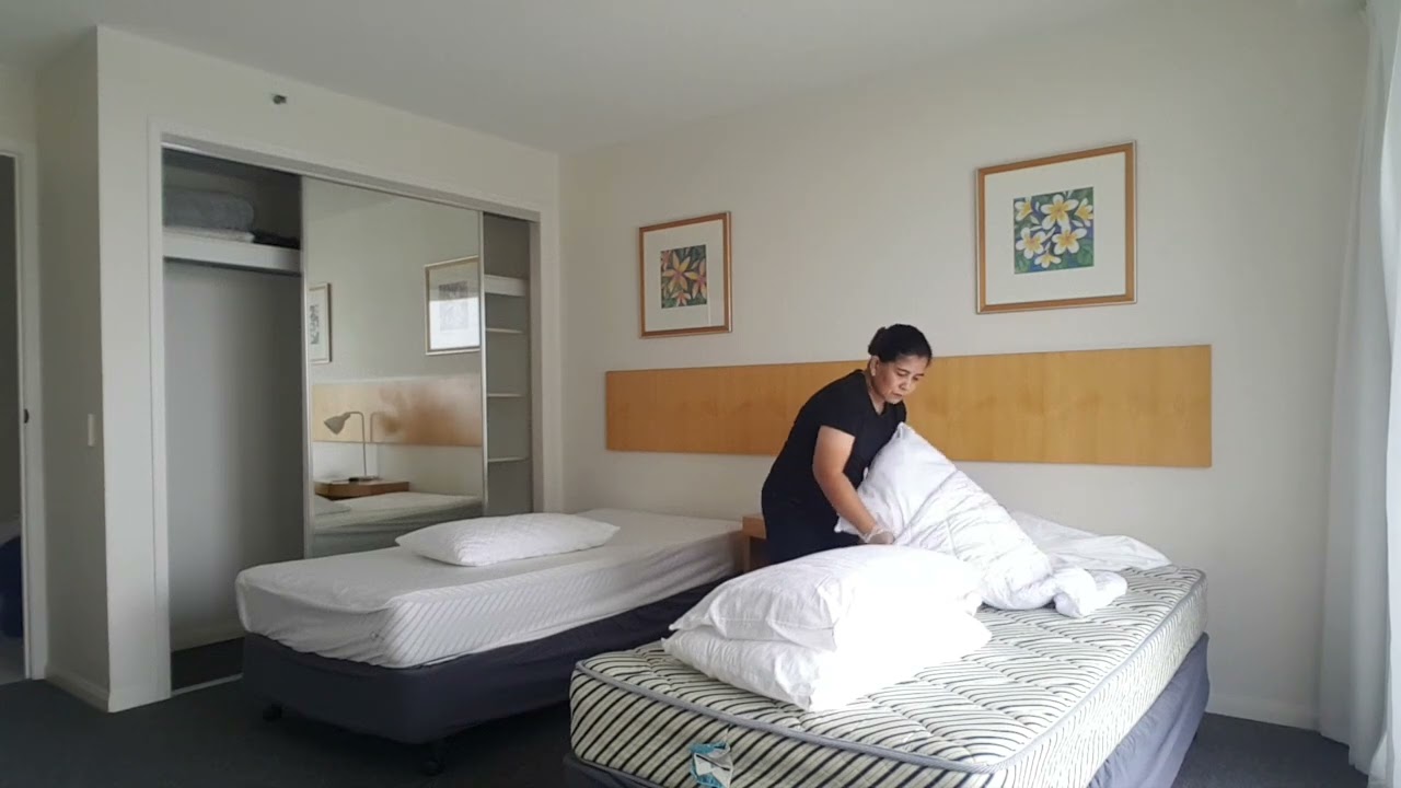 Housekeeping routine changing bed  protectors 