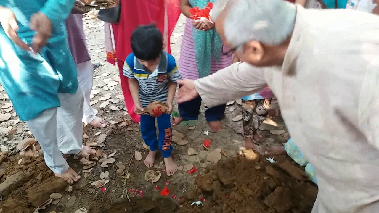 Put coconuts into the Morther Earth( by Delhi Yogis)