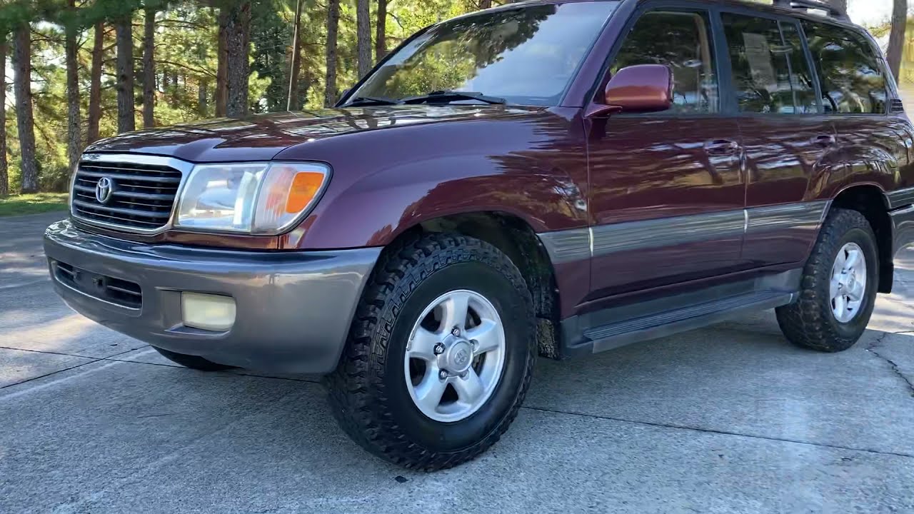 1999 Toyota Land Cruiser with 410k miles.  Look how clean it is. Selective Import Woodstock GA