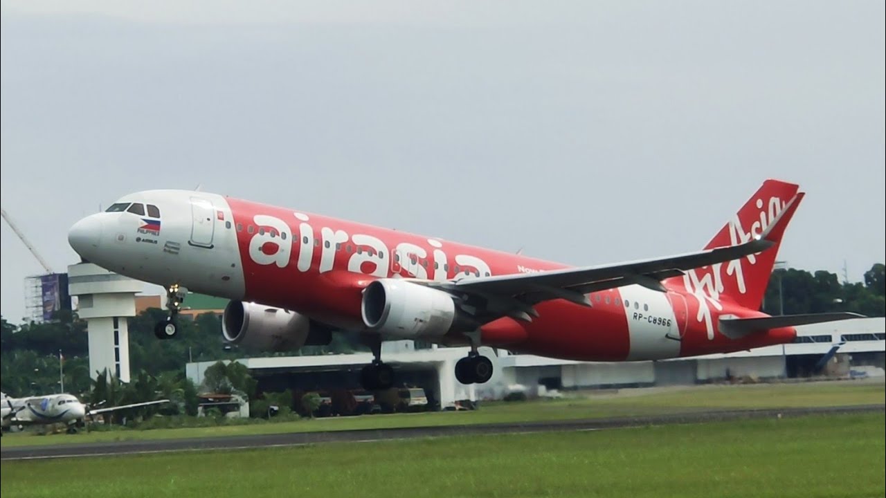 AirAsia Philippines A320 taking off at Davao International Airport