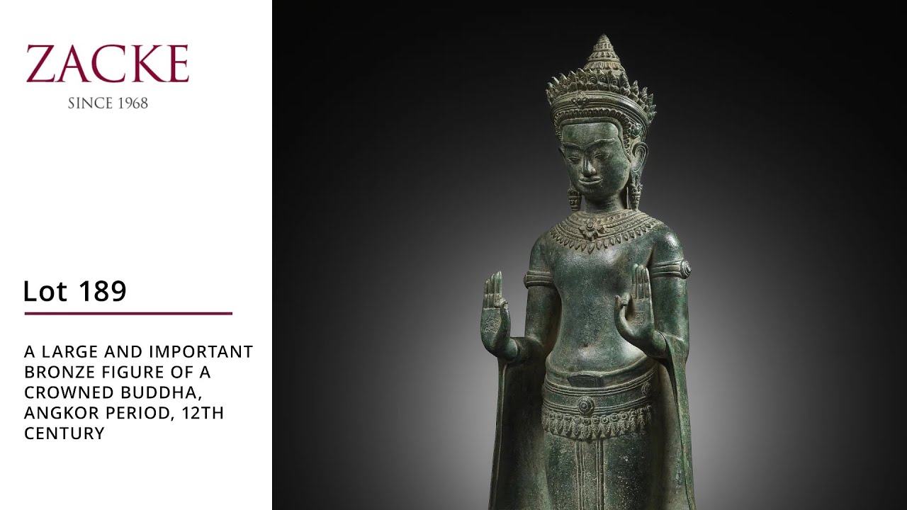 Lot 189: A LARGE AND IMPORTANT BRONZE FIGURE OF A CROWNED BUDDHA, ANGKOR PERIOD, 12TH CENTURY