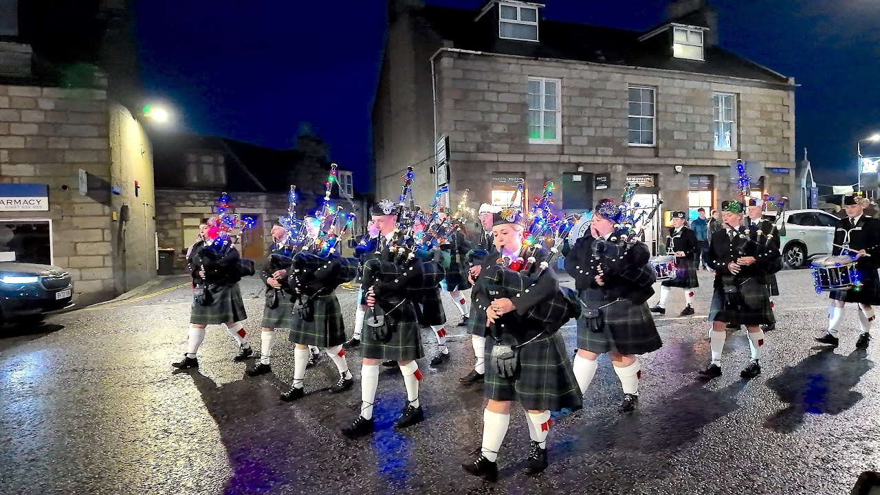 Festive Kintore Pipe Band march in for the 2025 Kintore Christmas Lights Switch on in Scotland