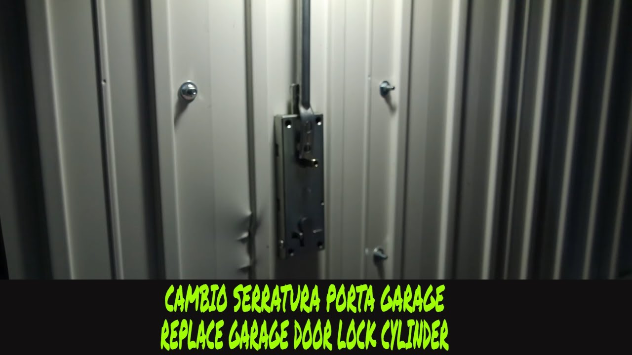 Cambio nottolino porta basculante box auto fai da te(How to DIY replace a garage door lock cylinder)