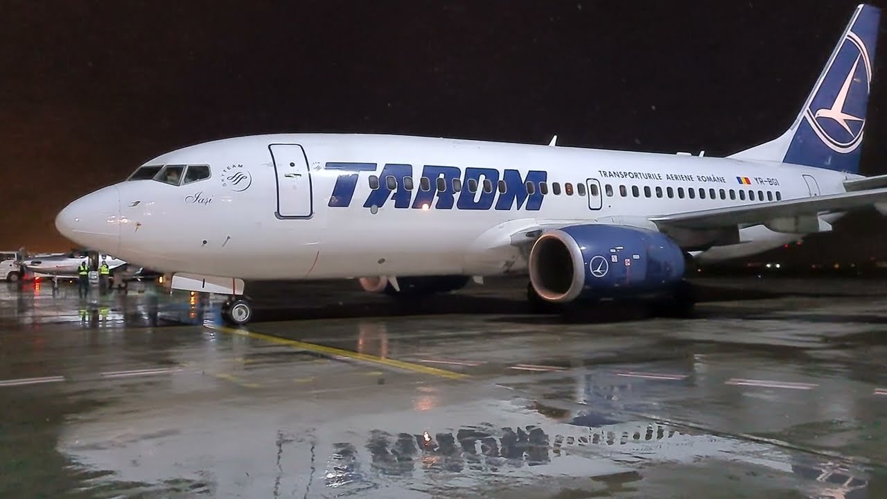 Airplane traffic on a winter night at the airport. The star, an Airbus A330