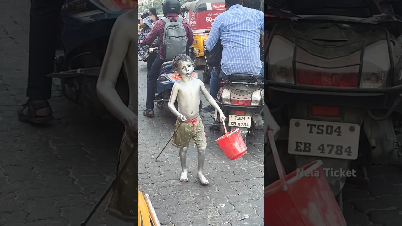 Small child begging at traffic Signal #begging #beggers #traffic #humantrafficking #childlabour