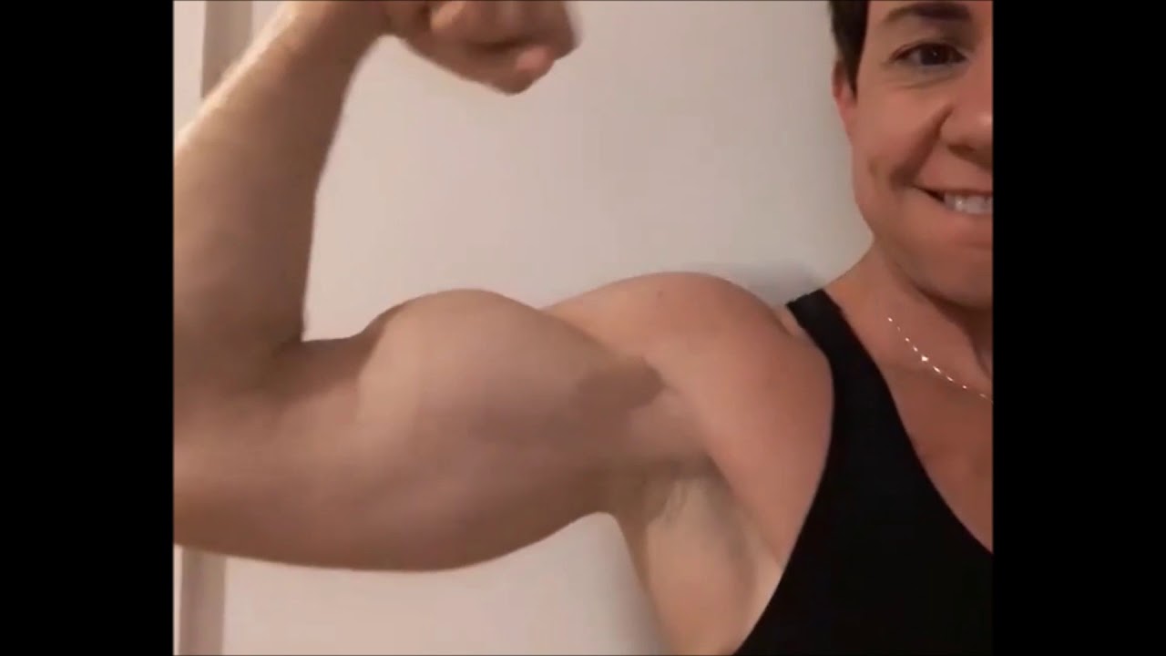 Mature Woman Flexing Biceps