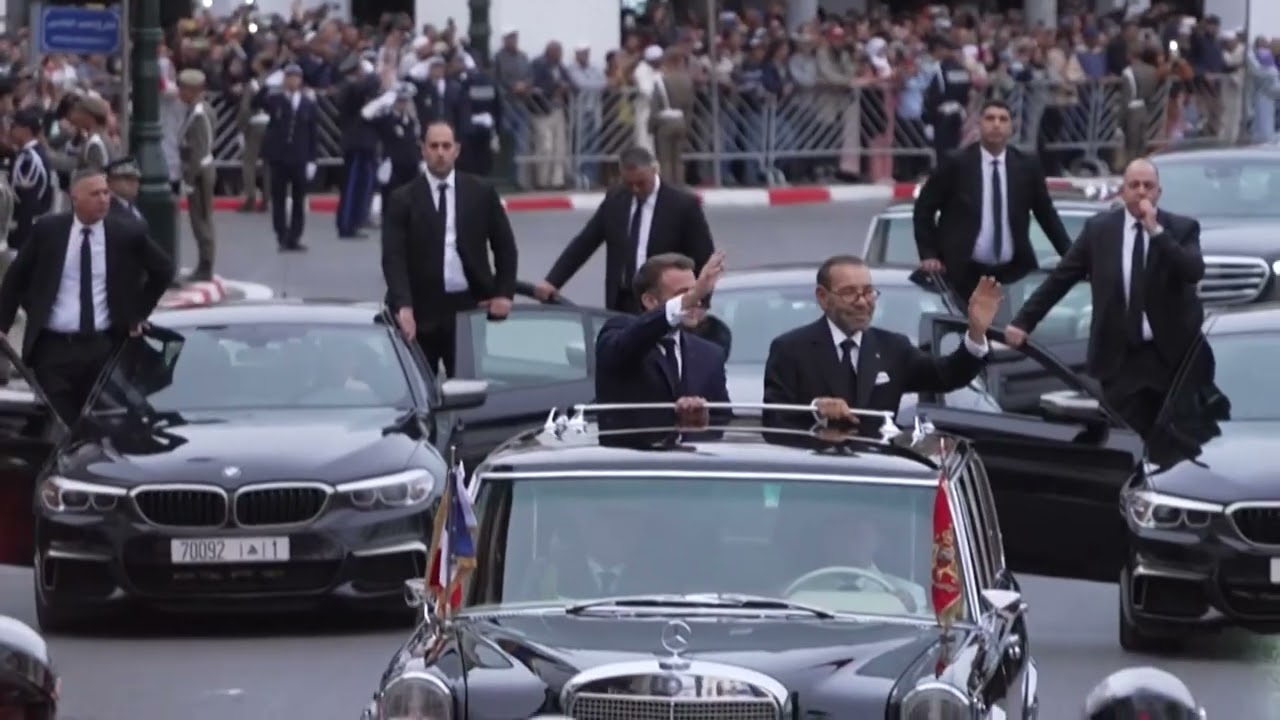 King Mohammed VI and Emmanuel Macron ride through Moroccan capital