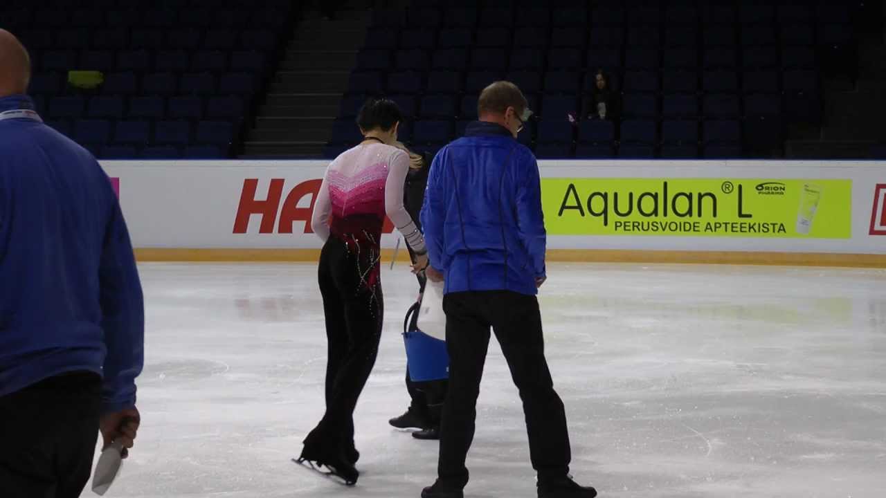 Finlandia Trophy 2012 Espoo 6.10.2012 Men´s winner Yuzuru Hanyu JPN helps repair ice
