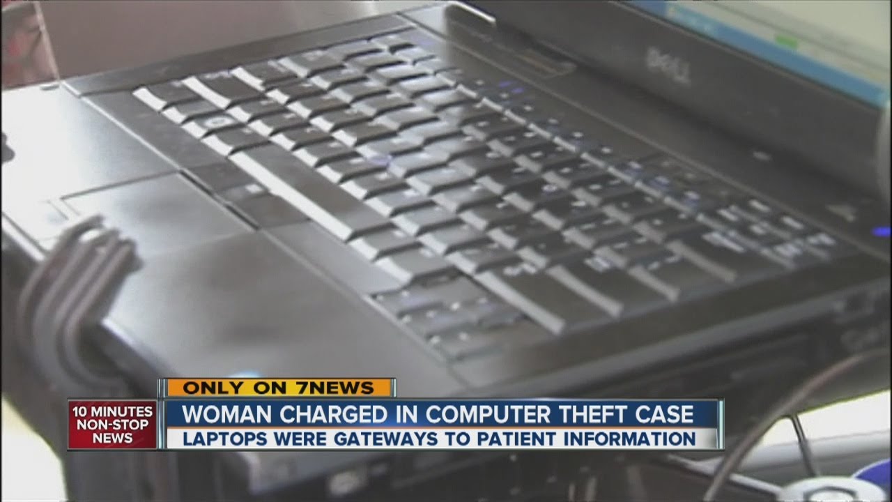 Woman charged in computer theft case