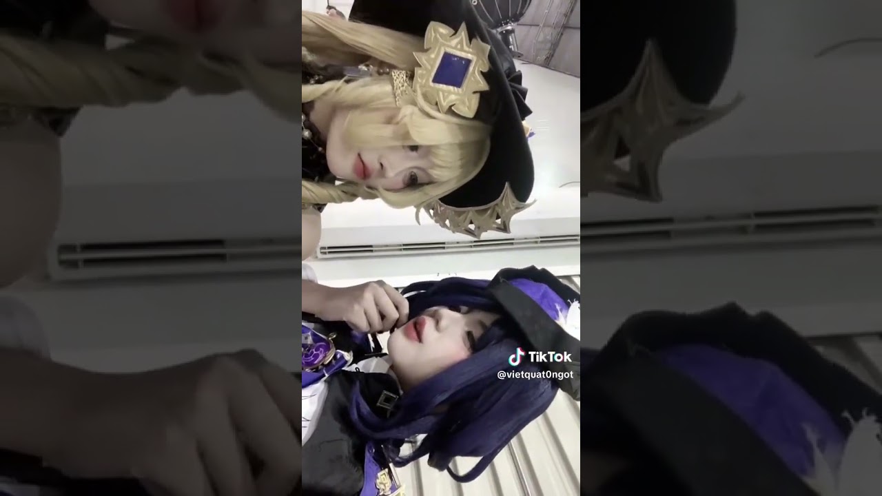 Lesbian cosplayers kiss