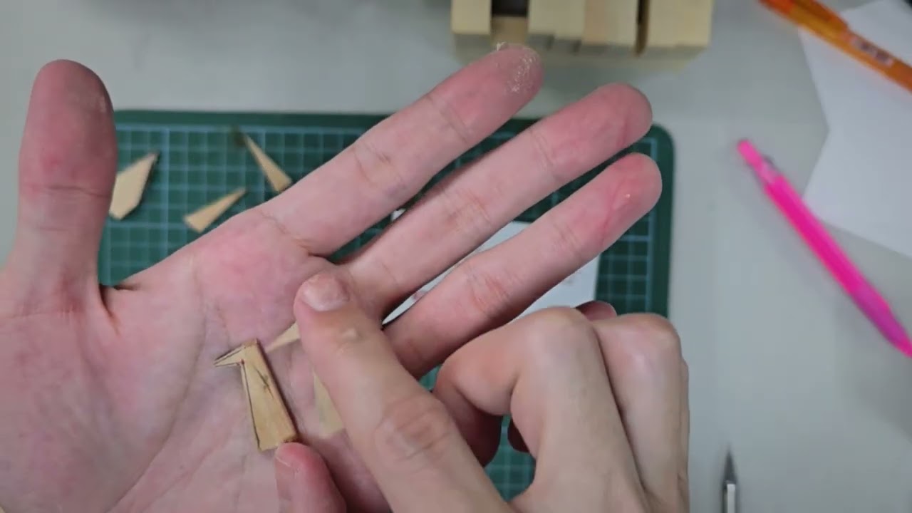 Turning a paper crane into a wooden version using popsicle sticks