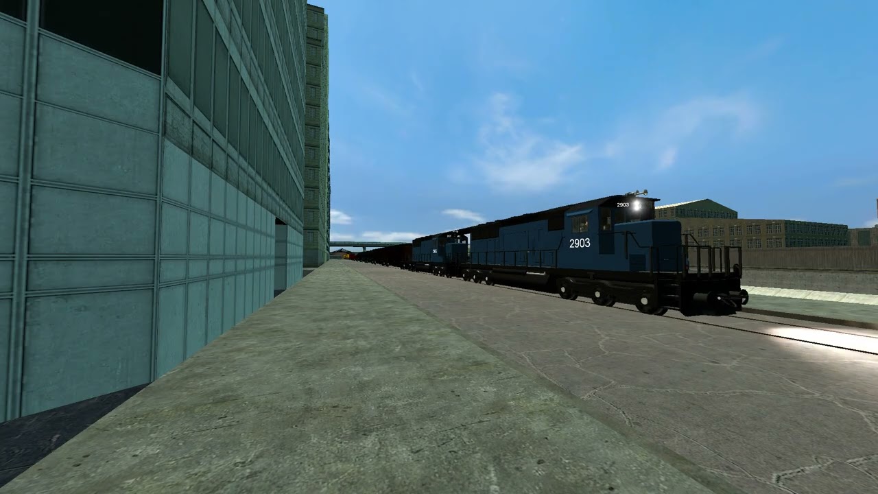 Train passing over the riverside in GM bigcity inbound from industrial yard