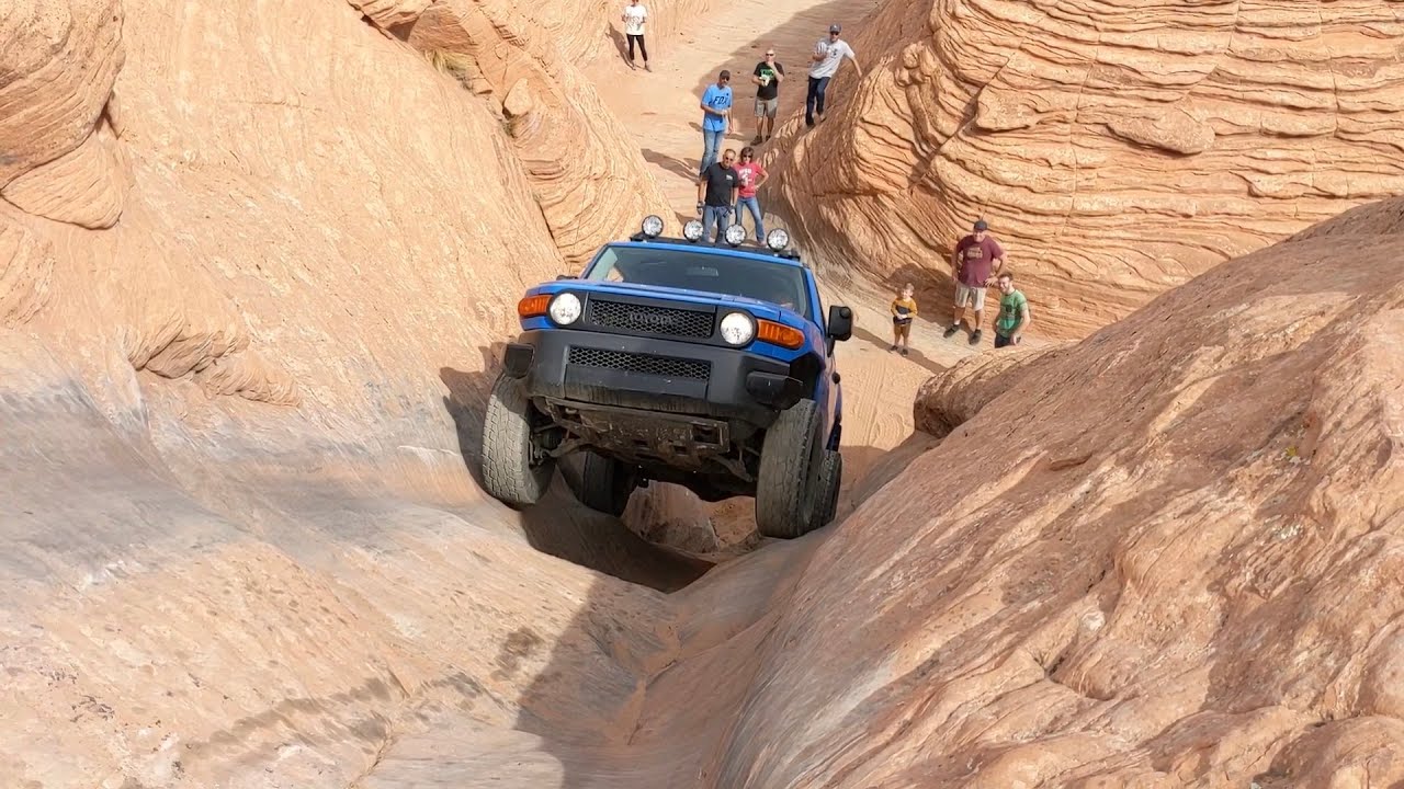 Toyota Fj Cruiser and a Lexus take on the Chute at Sand hollow state park - rock crawler