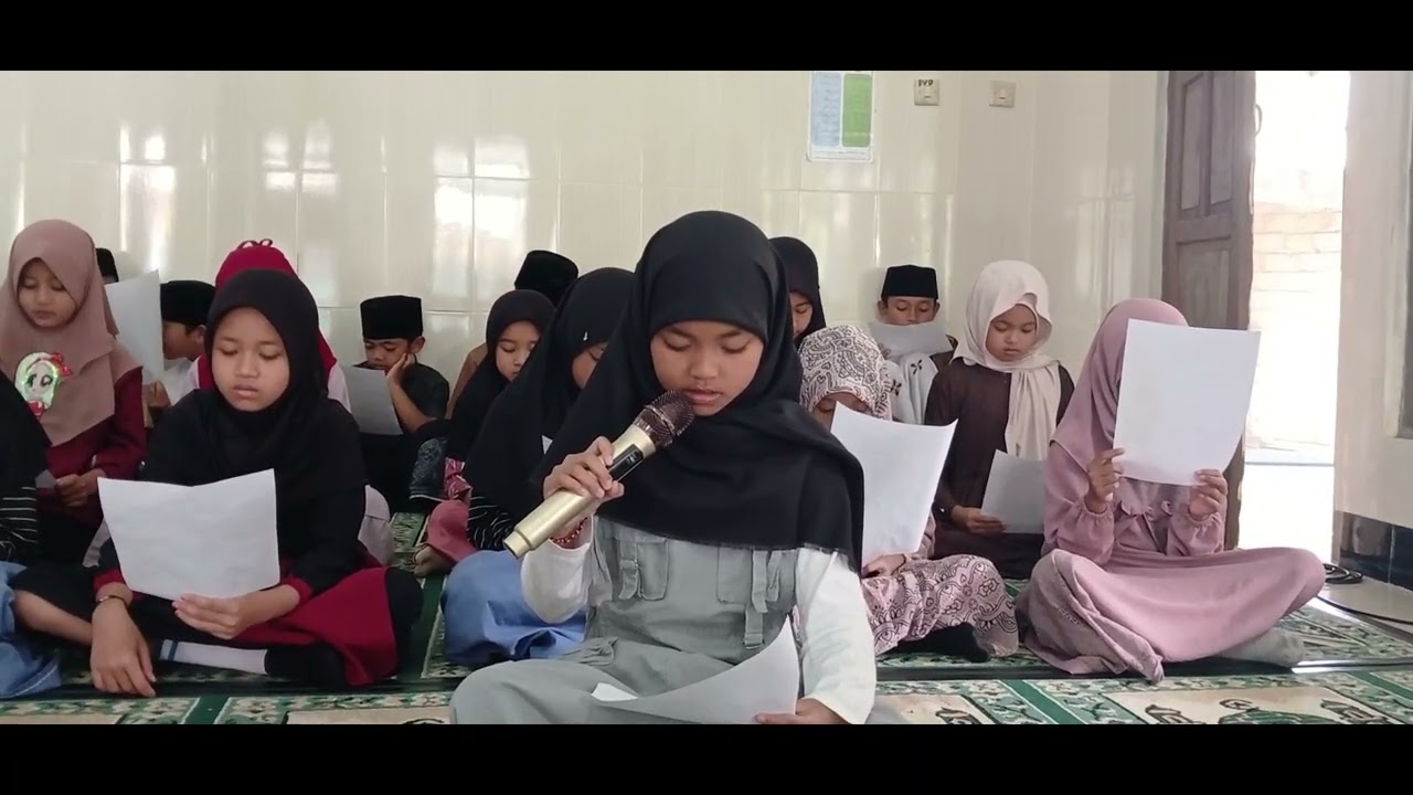 TAMPILAN QIRO'AH OLEH SISWA SISWI MI NU ASSALAAM WONOREJO BARAT